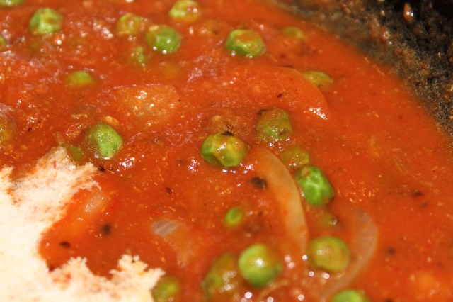 Add tomato puree, then a dash of cream