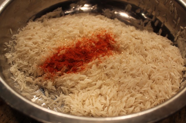 Wash, drain and season rice