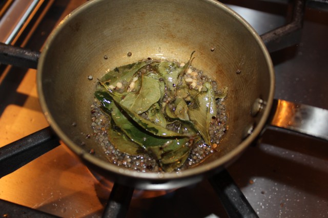 Tempering mix of mustard, black Bengal gram dal and curry leaves