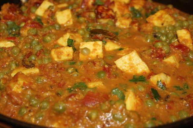 Fold in the peas and paneer