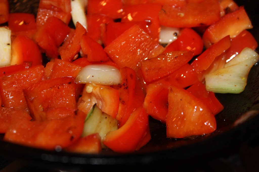 Stir fry the red pepper and bok choy on high heat