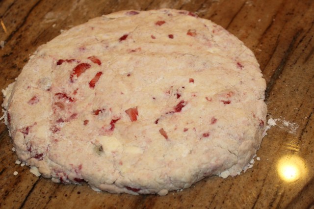 Quickly pat out the dough, trying not to warm it too much.