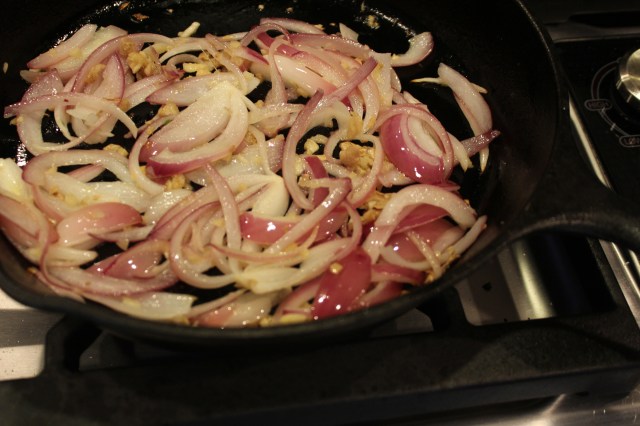 Sliced onion sauteed with minced garlic and ginger